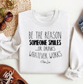 Be The Reason Someone Smiles Sweatshirt Classic Womenswear T-Shirts, Hoodie | GrindPrints.com