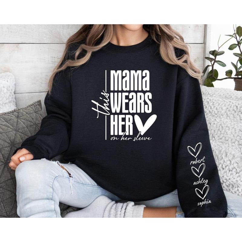 Custom This Mama Wears Her Heart On Her Sleeve Hoodie, Personalized Mom Sweatshirt With Kids Names, Cute Mama Hoodie,...