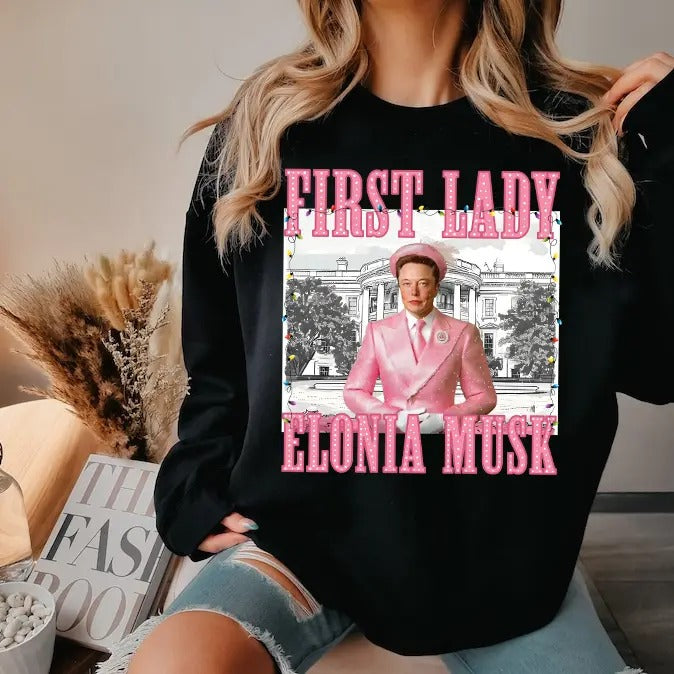 Elonia Mu.sk First Lady Christmas 2024 shirt - Unisex Heavy Cotton Tee Basic Hoodie, Sweatshirt | GrindPrints.com