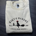 Embroidered KiKi's Bakery Unisex Crewneck Sweatshirt, Jiji Shirt, Kiki's Delivery Service, Studio Ghibli Sweatshirt,...
