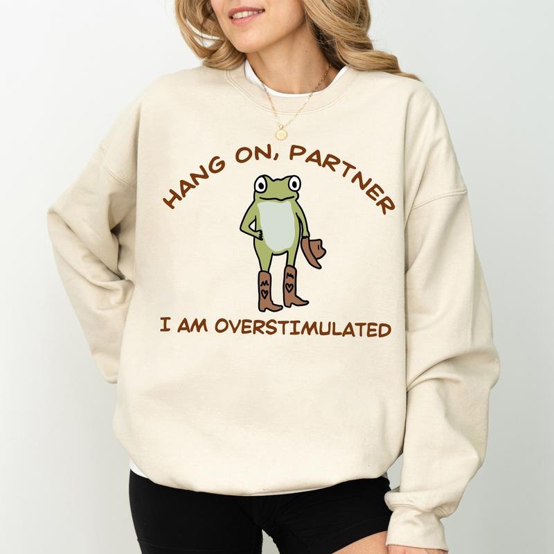 Frog Hang On I'm Overstimulated Sweatshirt, Western Cowboy Frog Sweater, Funny Frog Meme Tops, Weirdcore Gen Z Crewneck,...