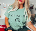 G is Grinchi Holiday T-Shirt Christmas Parody Designer Tshirt Snow Grinch Tee Bright Lights T-Shirt Grinchi Christmas Tee...