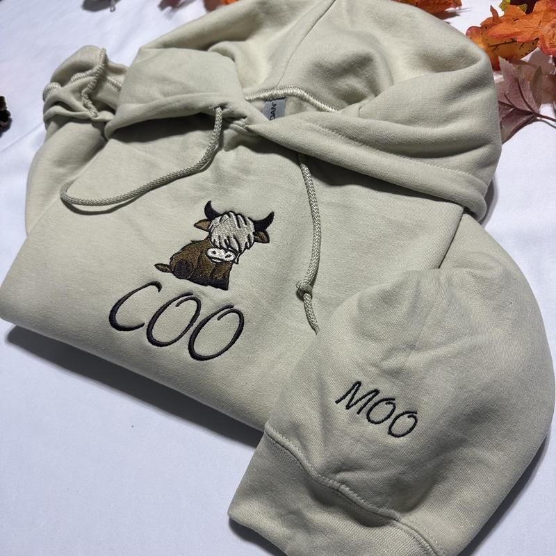 Highland Cow embroidered hoodie; Highland COO embroidered hoodie; Highland COO with MOO embroidered on the cuff of the...