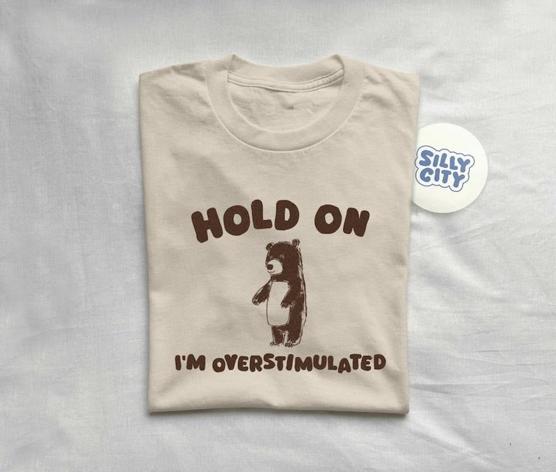 Hold On I'm Overstimulated - Unisex  sweater T-Shirts, Hoodie, Sweatshirt | GrindPrints.com
