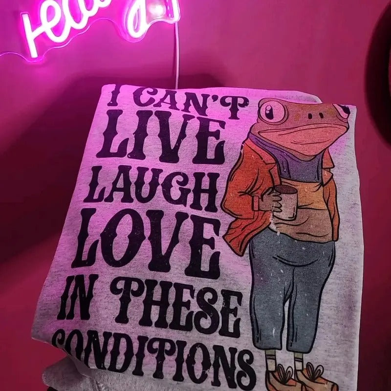 I can't live laugh love in these conditions Graphic Tee Hoodie, Sweatshirt | GrindPrints.com