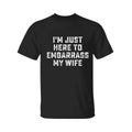 I'm Just Here To Embarrass My Wife Shirt, Funny Husband T-Shirt, Men's Cross Graphic Tee, 2025 Casual Summer Outfit, For...