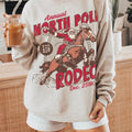 North Pole Rodeo Sweatshirt UNISEX Cowboy Santa Crewneck Country Christmas Shirt Western Santa Claus PJ Groovy Festive...