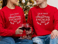 Our First Christmas Engaged 2023 Sweatshirt, Matching New Engaged Couple Xmas Hoodie, Engagement Gift Holiday Sweater,...