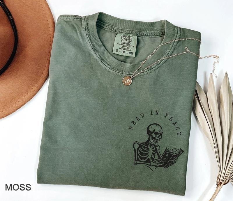 Read in Peace Shirt, Books Shirt, bookish Merch, Reading t-shirt, skeleton readingShirt, Book Lover tshirt, Book Shirt,...