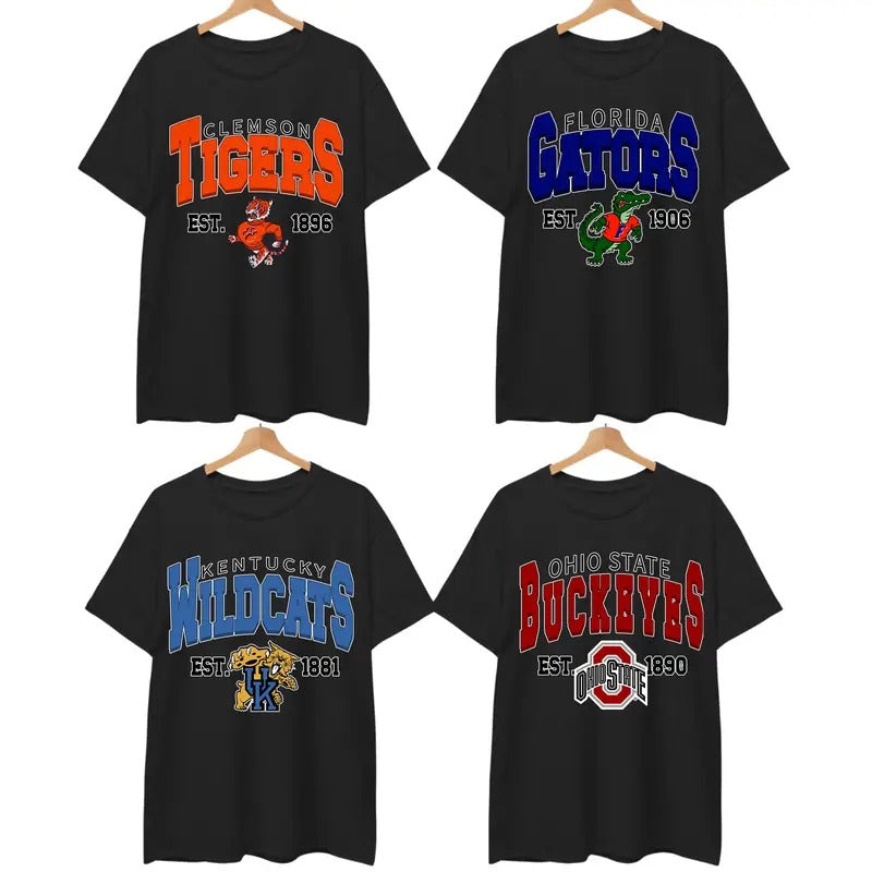 Retro College All Team Graphic Black T-Shirt, Classic University Mascot Print, 90s-Inspired Campus Spiritwear for Sports...