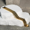 Roly Statement Bracelet - Gold-Toned Design on White Surface Product Image T-Shirts, Hoodie, Sweatshirt | GrindPrints.com