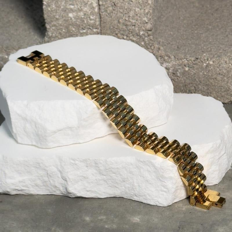 Roly Statement Bracelet - Gold-Toned Design on White Surface Product Image T-Shirts, Hoodie, Sweatshirt | GrindPrints.com