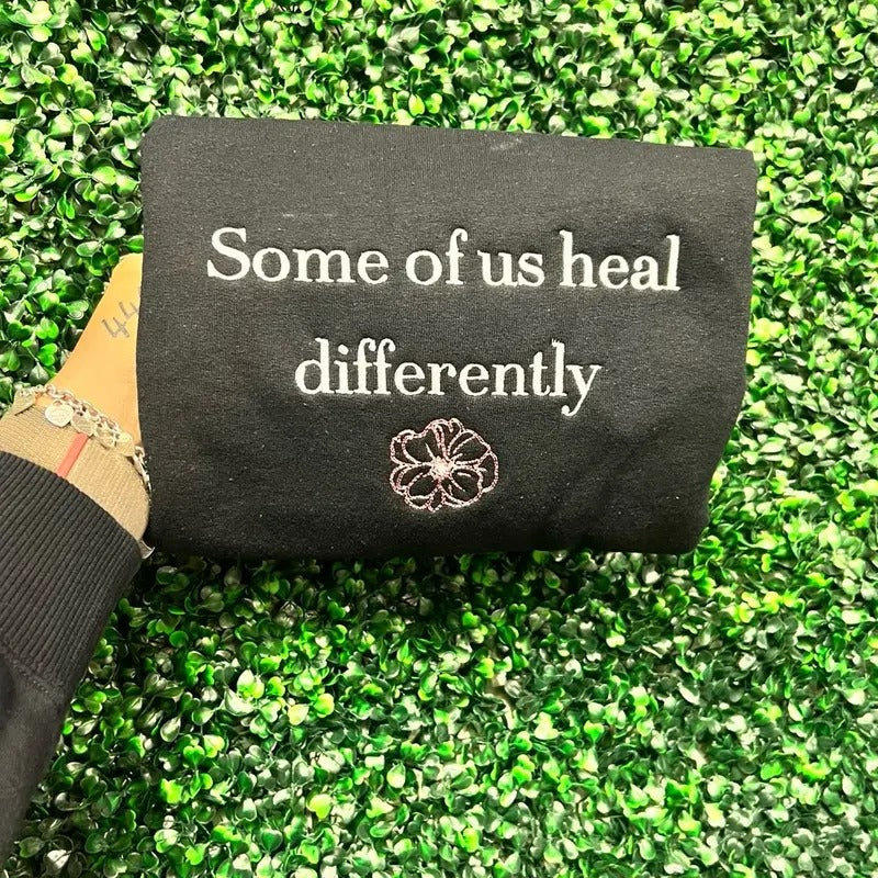Some of us heal differently embroidered sweater T-Shirts, Hoodie, Sweatshirt | GrindPrints.com