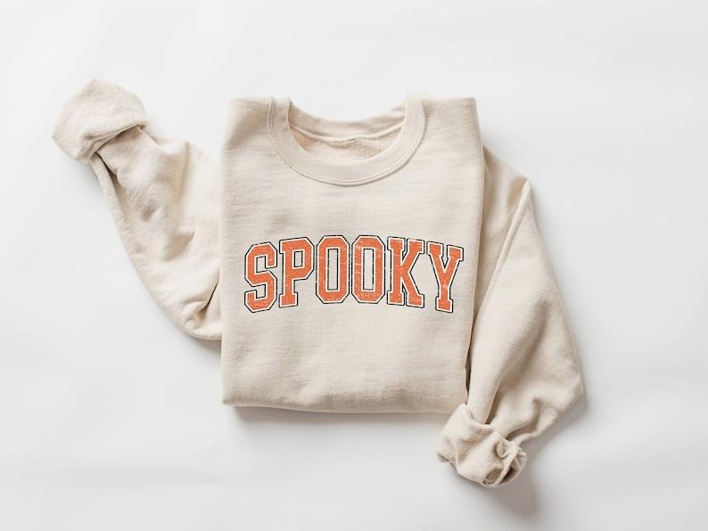 Stay Spooky Sweatshirt, Halloween Sweatshirt, Womens Halloween Sweatshirt, Spooky Season Shirt, Unisex Classic Cotton...