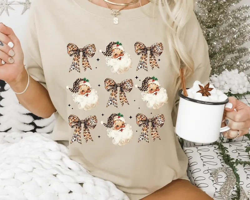 Vintage Leopard Santa Christmas Shirt - Coquette Bows and Santa Holiday Graphic Tee - Casual Winter Softstyle Unisex...